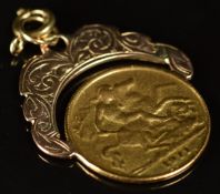1911 gold half sovereign with 9ct rose gold mount, 5.4g