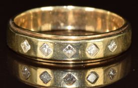 A 9ct gold ring set with five princess cut diamonds, total 0.25ct, 6.2g, size Z