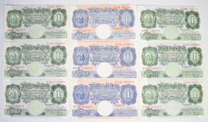 Nine Bank of England 'Britannia' Series George V and Elizabeth II £1 banknotes, featuring the