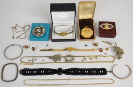 A collection of jewellery including three silver bangles (38g), silver curb link chain (13.9g),