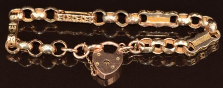 A 9ct gold bracelet made from a Victorian watch chain of pierced links and faceted links, with heart
