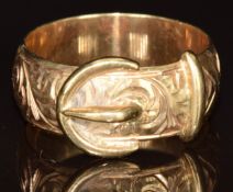 A 9ct gold buckle ring with scrolled decoration, 6.6g, size R