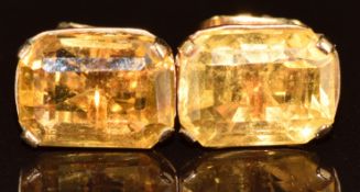 A pair of 9ct gold earrings each set with an emerald mixed cut citrine, 2.4g
