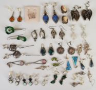 Twenty three pairs of silver earrings including opal, cameos, azurite, labradorite, amber, etc