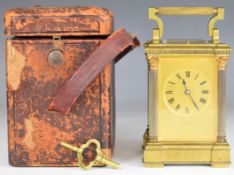 Brass striking and repeating carriage clock with breakfront surround, bevelled glass and reeded