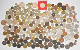 Collection of British and world base metal and silver coins, mostly from the 19th and 20th centuries