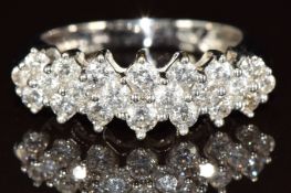 A 14k white gold ring set with twenty-two round cut diamonds, the total diamond weight approximately