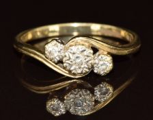 A 9ct gold ring set with three diamonds, 2.2g, size R