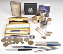 Six hallmarked silver napkin rings to include one with embossed image of Sulgrave Manor, three