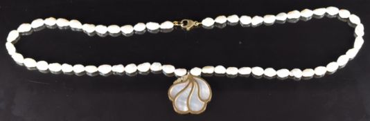 A 9ct gold pendant set with diamonds and mother of pearl (2.3cm) on a strand of freshwater pearls