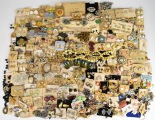 A collection of jewellery including vintage brooches and earrings, enamel buckle, cameo brooches and