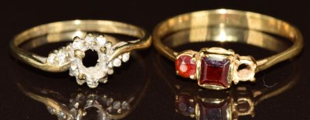 Two gold rings (damaged), one 18ct gold set with garnets (2.6g, size T) and one 9ct gold set with