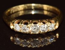 A c1900 18ct gold ring set with five old cut diamonds, 2.5g, size L