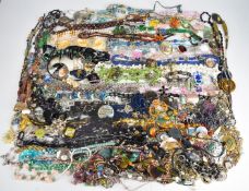 A collection of jewellery including glass pendants, necklaces including vintage glass beaded, mother