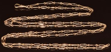 A c1900 9ct gold guard chain made up of knotted and elongated links, 21g, 138cm