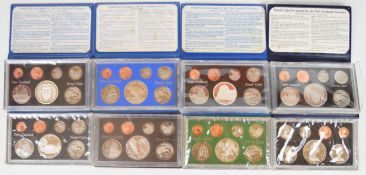 Eight New Zealand proof coin sets each containing seven coins from one cent to one dollar,