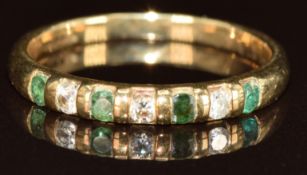 A 9k gold ring set with diamonds and emeralds, 1.8g, size N