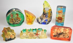 Seven mid-century modern lucite / acrylic lamps, barometers and sea life displays with crabs,