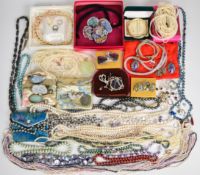 A collection of jewellery including 9ct gold cased watch, nineteen freshwater pearl necklaces,