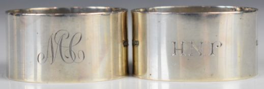 Pair of hallmarked silver napkin rings, Sheffield 1927 and 1930, maker of both Atkin Brothers,
