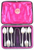 Six Georgian hallmarked silver teaspoons together with a pair of hallmarked silver sugar tongs,