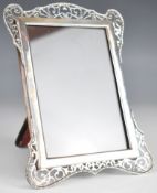 George V hallmarked silver photograph frame with pierced decoration and easel back, to suit 6 x 4