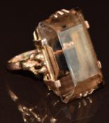 A 9ct gold ring set with an emerald cut smoky quartz, 11.5g, size L