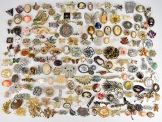 A collection of vintage brooches including Lucite, paste, Exquisite, Vendome, Kirks Folly, Art Deco,