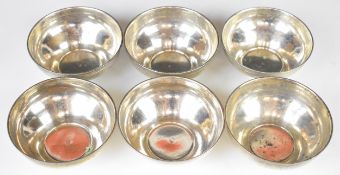 Set of six possibly German silver bowls, each with beaded edges and engraved decoration, each marked