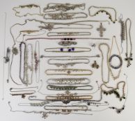 Twenty eight diamanté necklaces