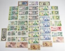 Small collection of Scotland, Jersey, Bank of England and world banknotes, including three