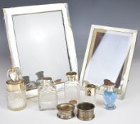 Hallmarked silver items comprising two photo photograph frames, the larger to suit 8 x 6 inch photo,