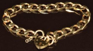 A 9ct gold curb link bracelet with heart padlock clasp, 18.6g, 18cm