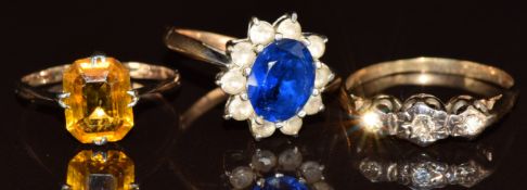 Three 9ct gold rings, two set with paste and one with diamonds, 7.1g, size O, P & L