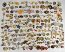 A collection of vintage brooches including four Hollywood, Sarah Coventry, Art Deco, enamel and