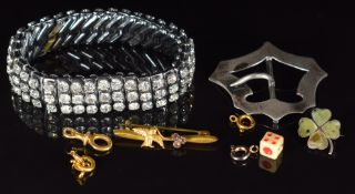 A diamanté bracelet, hallmarked silver buckle, Connemara shamrock brooch, clasps, etc