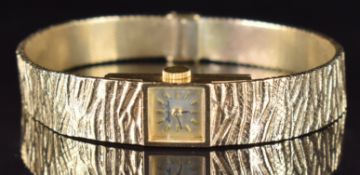 Bueche Girod 9ct gold ladies wristwatch with black hands, gold baton hour markers, silver dial and