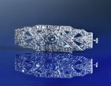 Art Deco platinum brooch set with diamonds, the centre diamond approximately 0.28ct, and the total