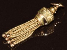 A yellow metal tassel charm, 2.1g, 3cm