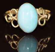 A 14k gold ring set with a blue cabochon, 2.1g, size P