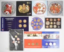 Modern British coin sets comprising Royal Mint 2000, 2004, 2005, larger 2005, two 2006, 2007, 2008
