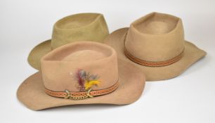 Three vintage Australian Akubra bushman's hats with leather trim comprising two 'Down Under' and '