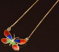 An 18ct gold necklace in the form of a butterfly set with enamel, 3.6g, 39.5cm