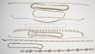 Ten silver necklaces including curb link, snake, sphere decoration, plaited, etc, 260g