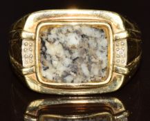 A 9ct gold ring set with kemnay granite and diamonds, 7.2g, size V