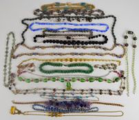 A collection of jewellery including Monet necklace, carved jet necklace, glass beaded bracelet,