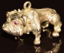 A 9ct gold charm / pendant in the form of a bulldog with synthetic ruby eyes, 8.6g, 2.5cm