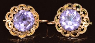 A pair of 14k gold earrings, each set with a round cut amethyst of approximately 12mm, 6.9g