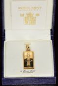 Royal Mint 1/4oz 9ct gold 'The Queen's Golden Jubilee' ingot pendant, in original box, 2.8cm