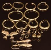 Eight pairs of 9ct gold earrings and two single 9ct gold earrings, 9.3g